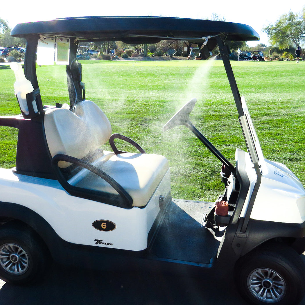 portable misting system attached to golf cart spraying mist